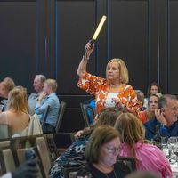 Woman holding baton