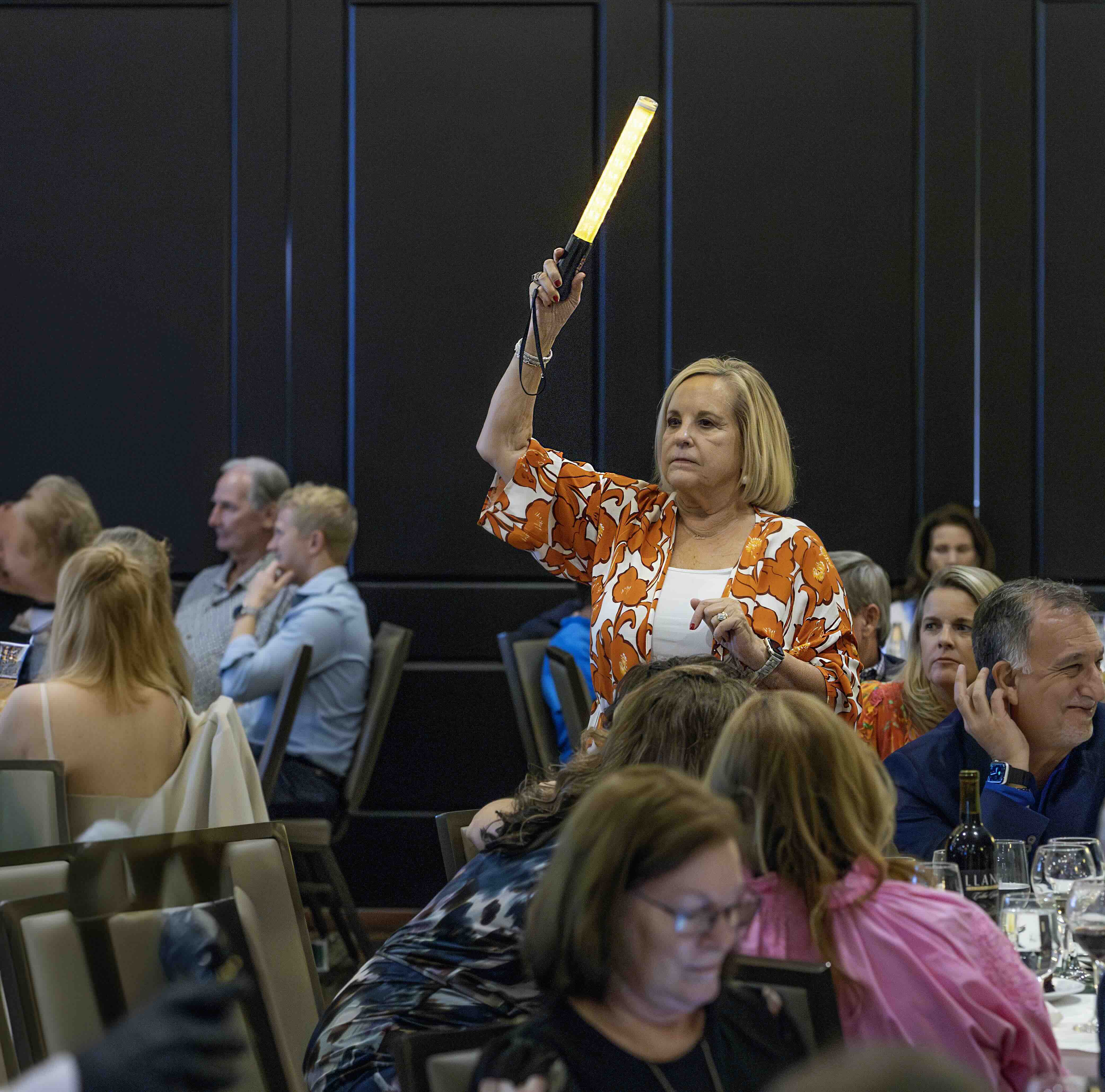 Woman holding baton